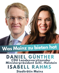Isabell Rahms, CDU-Landtagskandidatin, gemeinsam mit Daniel Günther, Ministerpräsident von Schleswig-Holstein und CDU-Landesvorsitzender, bei einem politischen Gespräch.